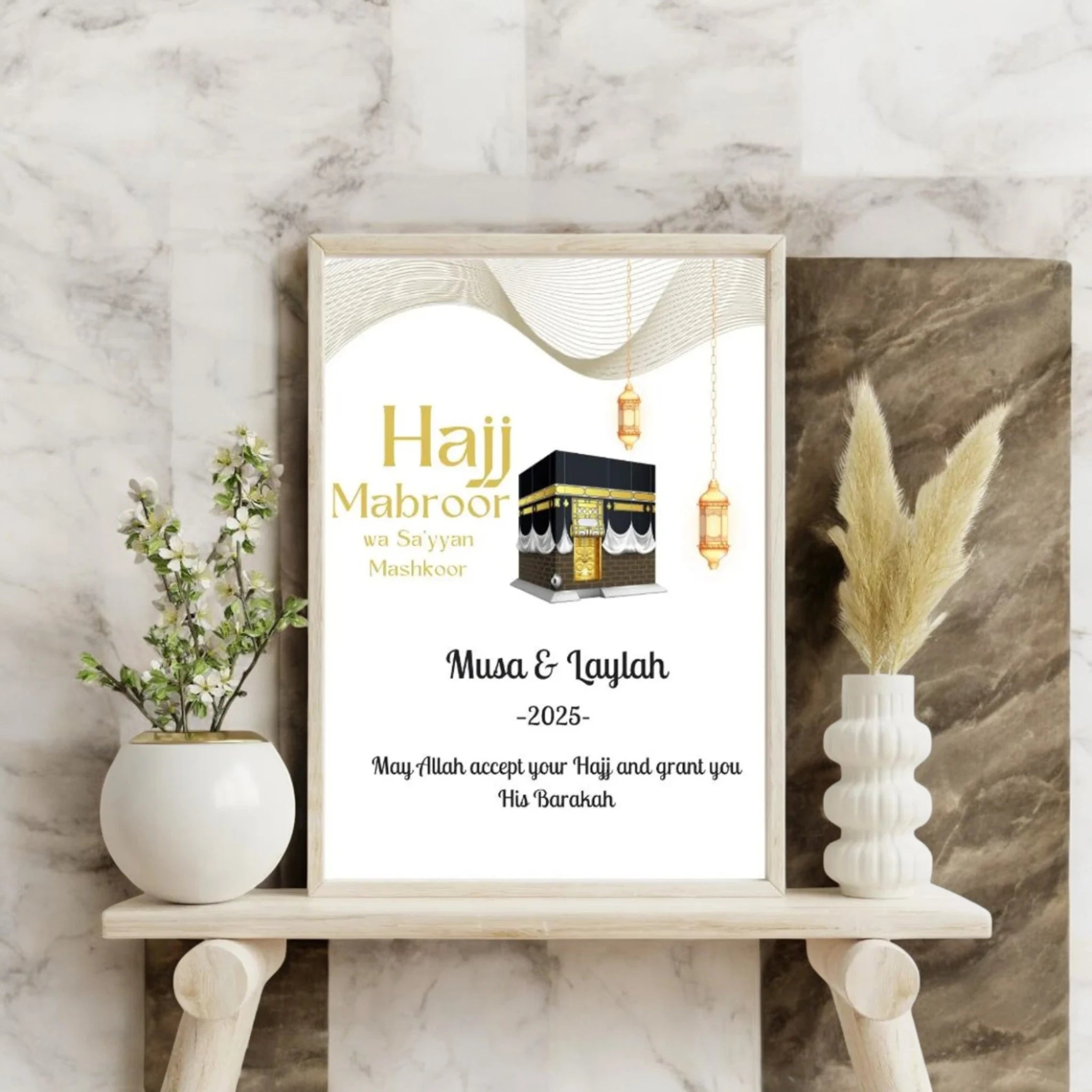 Custom Hajj Frame - Spiritual Keepsake | Handmade A3 Frame featuring Kaaba illustration, Islamic lanterns, and personalized Hajj message for Musa & Laylah. Main image