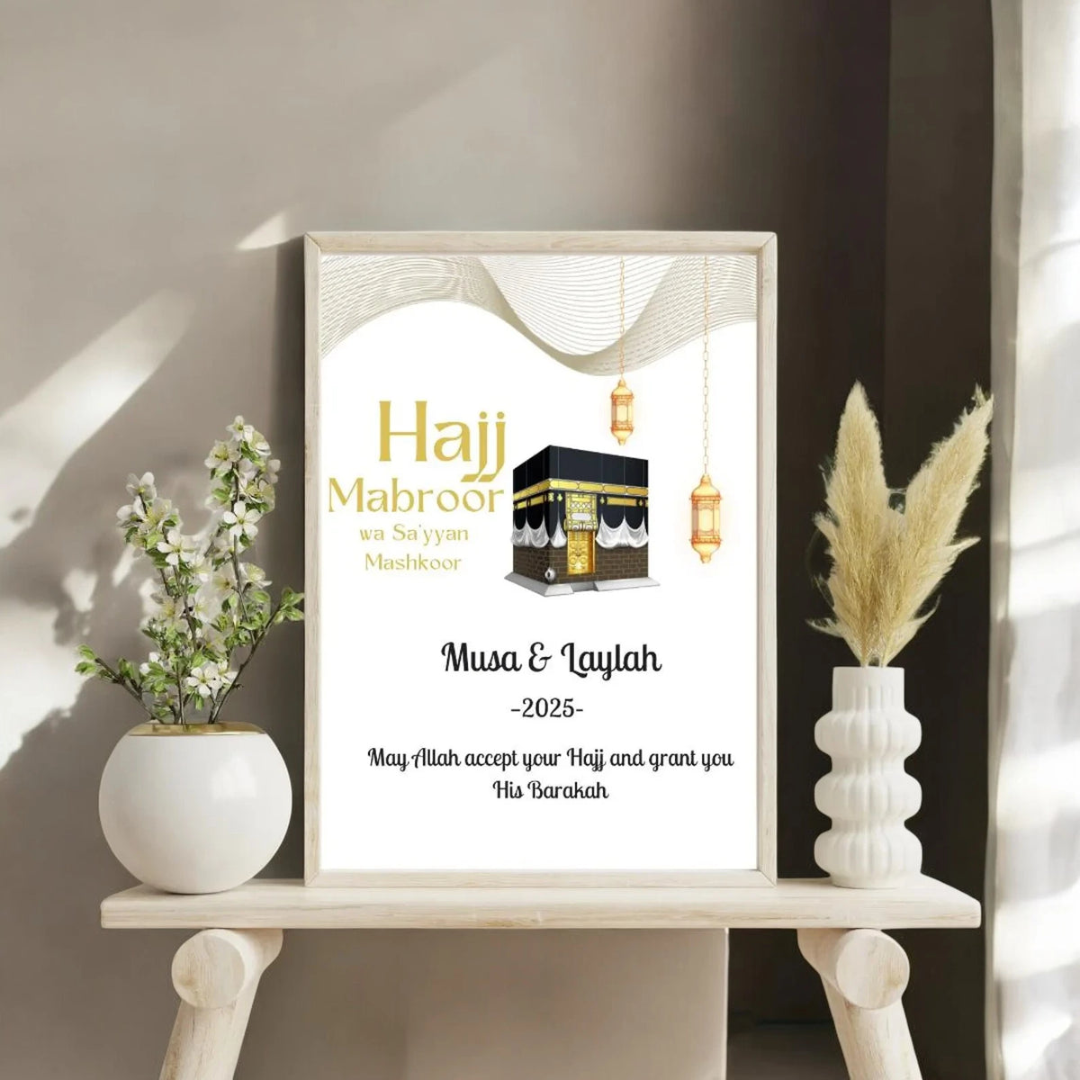 Celebrate a Spiritual Milestone with this Custom Hajj Frame in A3 size, showcasing Islamic decor elements and a personalized 2025 Hajj Mubarak message.