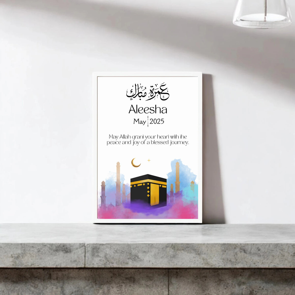 Umrah Mubarak Gift Frame - Mark the Journey | Handmade, A3 frame featuring Kaaba illustration with personalized name and date, ideal for Hajj & Umrah return gifts.
