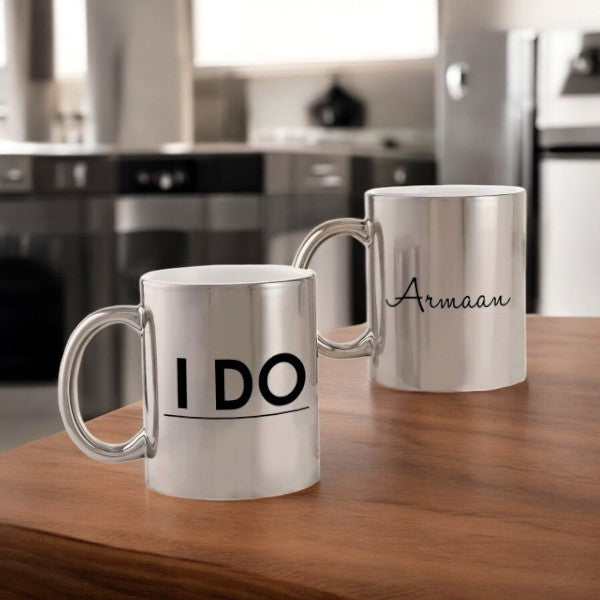 I Do Personalized Metallic Couple Mugs with custom name 'Armaan' on one mug and bold 'I DO' text on the other, ideal for wedding gifts.