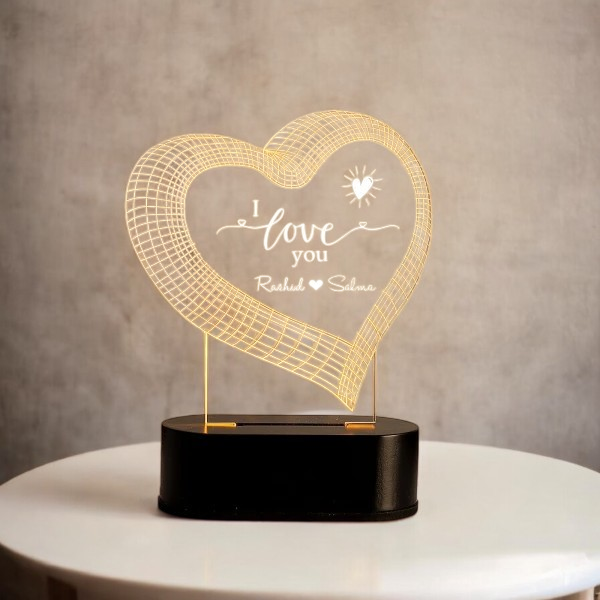 Heart-shaped Love LED Lamp with custom names on a black base, elegant romantic lighting for home decor or personalized wedding gifts.