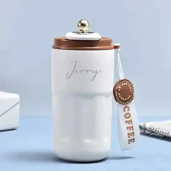 Customizable Brown Insulated Steel Flask labeled 'Jerry', featuring a spill-proof lid and stylish strap. Perfect for daily beverage use.