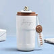 Customizable Brown Insulated Steel Flask labeled 'Jerry', featuring a spill-proof lid and stylish strap. Perfect for daily beverage use.