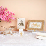 Elegant Offwhite Sawab-E-Jariya Quran gift set with gold-detailed box and book stand, perfect for religious gifting and ceremonial use.