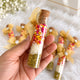 Close-up of Shahi Mix flavored sounf inside customized glass bottle – premium wedding favour for Muslim celebrations